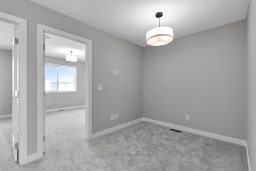 157 Dawson Wharf View, Chestermere, AB - Indoor Photo Showing Other Room