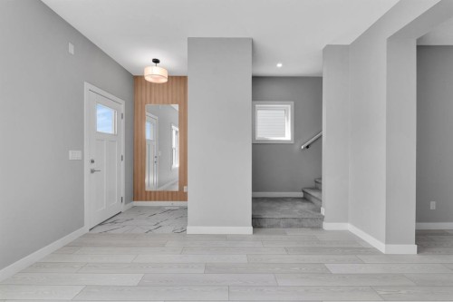 157 Dawson Wharf View, Chestermere, AB - Indoor Photo Showing Other Room