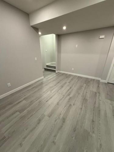 157 Dawson Wharf View, Chestermere, AB - Indoor Photo Showing Other Room