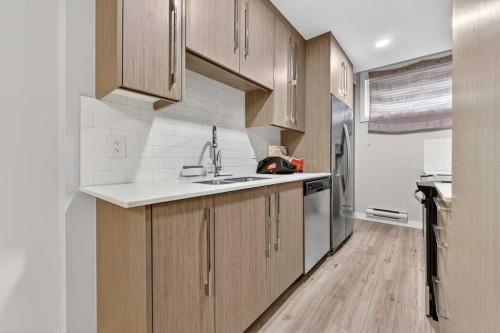132 Corner Meadows Gate Ne, Calgary, AB - Indoor Photo Showing Kitchen With Double Sink
