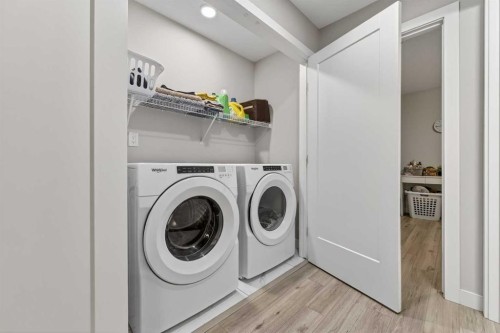 132 Corner Meadows Gate Ne, Calgary, AB - Indoor Photo Showing Laundry Room