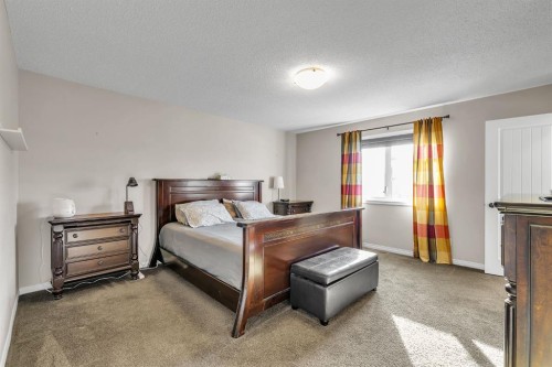 31 Walden Court Se, Calgary, AB - Indoor Photo Showing Bedroom