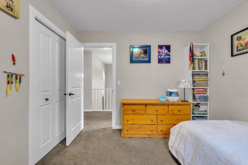 31 Walden Court Se, Calgary, AB - Indoor Photo Showing Bedroom