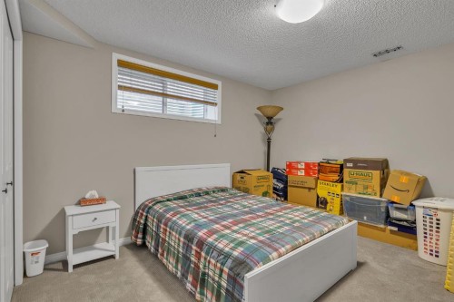 31 Walden Court Se, Calgary, AB - Indoor Photo Showing Bedroom