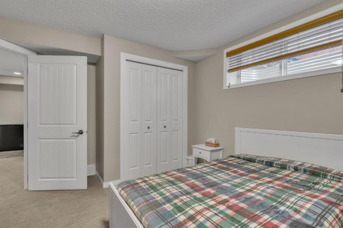 31 Walden Court Se, Calgary, AB - Indoor Photo Showing Bedroom