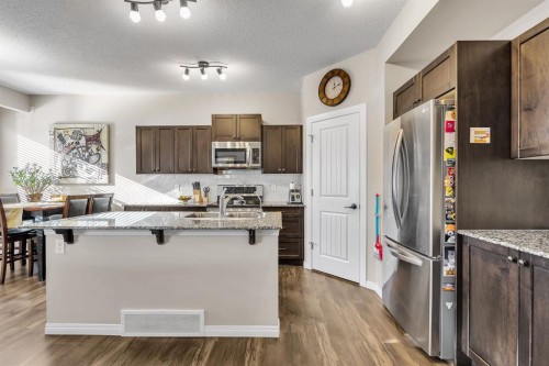 31 Walden Court Se, Calgary, AB - Indoor Photo Showing Kitchen With Stainless Steel Kitchen With Upgraded Kitchen