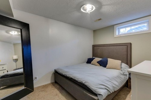 1324 Lake Sylvan Drive Se, Calgary, AB - Indoor Photo Showing Bedroom