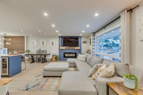 1324 Lake Sylvan Drive Se, Calgary, AB - Indoor Photo Showing Living Room With Fireplace
