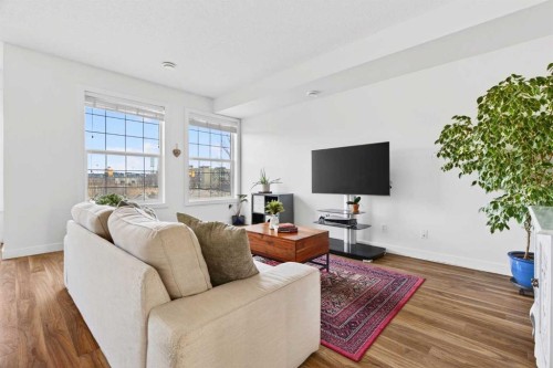 9-43 Springborough Boulevard Sw, Calgary, AB - Indoor Photo Showing Living Room
