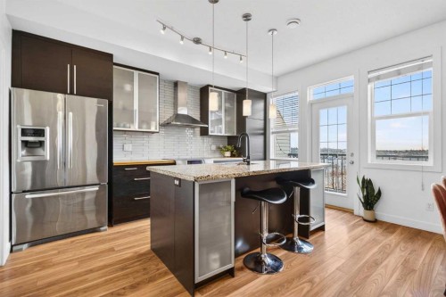9-43 Springborough Boulevard Sw, Calgary, AB - Indoor Photo Showing Kitchen With Stainless Steel Kitchen With Upgraded Kitchen