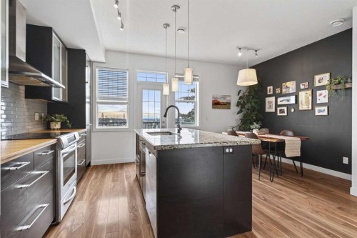 9-43 Springborough Boulevard Sw, Calgary, AB - Indoor Photo Showing Kitchen With Upgraded Kitchen