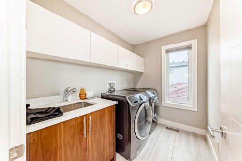 2614 21 Street Sw, Calgary, AB - Indoor Photo Showing Laundry Room