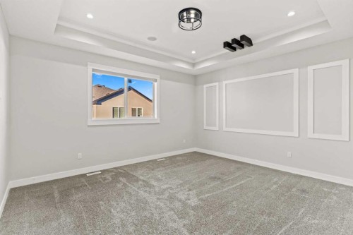 111 Kinniburgh Place, Chestermere, AB - Indoor Photo Showing Other Room