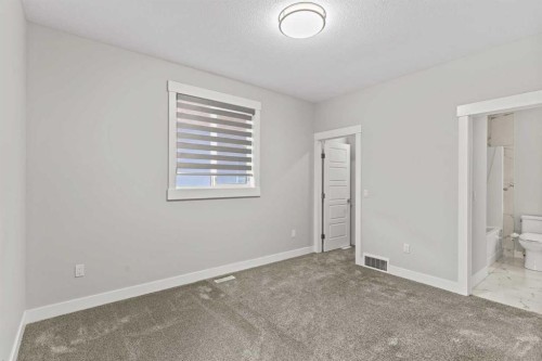 111 Kinniburgh Place, Chestermere, AB - Indoor Photo Showing Other Room