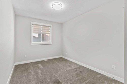111 Kinniburgh Place, Chestermere, AB - Indoor Photo Showing Other Room