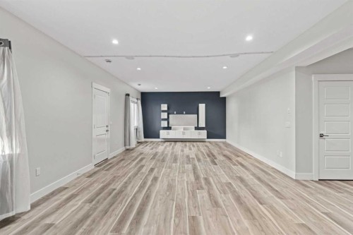 111 Kinniburgh Place, Chestermere, AB - Indoor Photo Showing Other Room