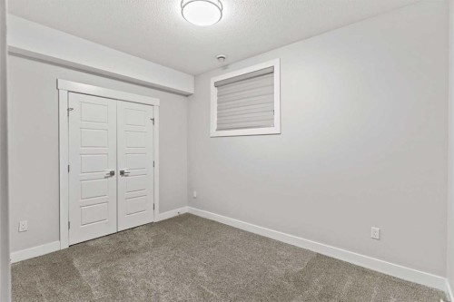 111 Kinniburgh Place, Chestermere, AB - Indoor Photo Showing Other Room