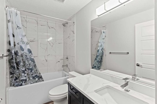 111 Kinniburgh Place, Chestermere, AB - Indoor Photo Showing Bathroom