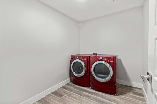 111 Kinniburgh Place, Chestermere, AB - Indoor Photo Showing Laundry Room