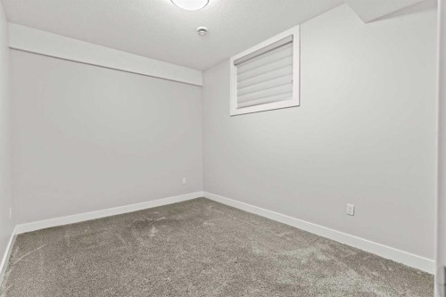 111 Kinniburgh Place, Chestermere, AB - Indoor Photo Showing Other Room