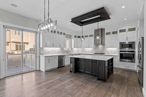 111 Kinniburgh Place, Chestermere, AB - Indoor Photo Showing Kitchen With Stainless Steel Kitchen With Upgraded Kitchen