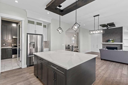 111 Kinniburgh Place, Chestermere, AB - Indoor Photo Showing Kitchen With Stainless Steel Kitchen With Upgraded Kitchen