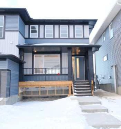 39 Agate Road, Cochrane, AB - Outdoor With Facade