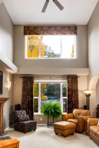 11756 Valley Ridge Boulevard Nw, Calgary, AB - Indoor Photo Showing Living Room With Fireplace