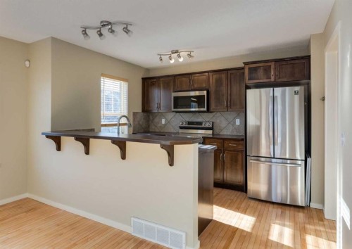 236 Silverado Drive Sw, Calgary, AB - Indoor Photo Showing Kitchen