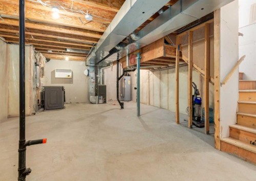 236 Silverado Drive Sw, Calgary, AB - Indoor Photo Showing Basement
