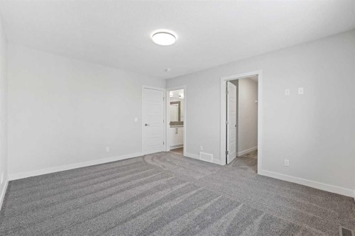 8 Topaz Place, Cochrane, AB - Indoor Photo Showing Other Room
