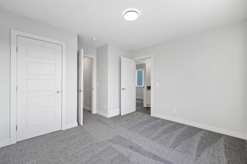 8 Topaz Place, Cochrane, AB - Indoor Photo Showing Other Room
