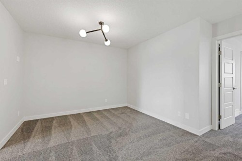 8 Topaz Place, Cochrane, AB - Indoor Photo Showing Other Room