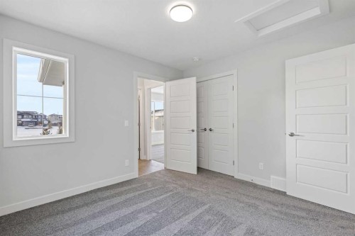 8 Topaz Place, Cochrane, AB - Indoor Photo Showing Other Room