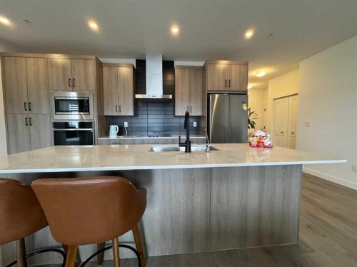 1207-55 Lucas Nw, Calgary, AB - Indoor Photo Showing Kitchen With Upgraded Kitchen