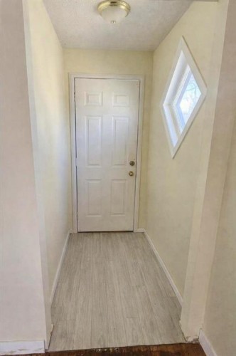 2311 22 Street, Nanton, AB - Indoor Photo Showing Other Room