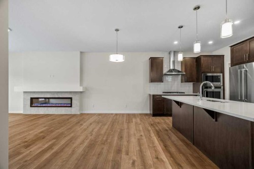 136 Wolf Hollow Manor Se, Calgary, AB - Indoor Photo Showing Kitchen With Upgraded Kitchen