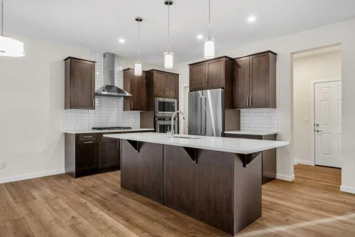 136 Wolf Hollow Manor Se, Calgary, AB - Indoor Photo Showing Kitchen With Upgraded Kitchen