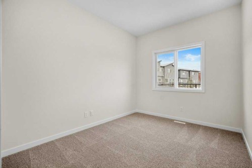 136 Wolf Hollow Manor Se, Calgary, AB - Indoor Photo Showing Other Room