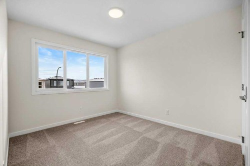 136 Wolf Hollow Manor Se, Calgary, AB - Indoor Photo Showing Other Room