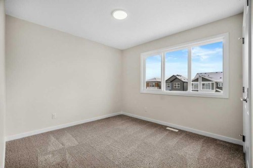 136 Wolf Hollow Manor Se, Calgary, AB - Indoor Photo Showing Other Room