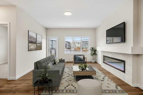 136 Wolf Hollow Manor Se, Calgary, AB - Indoor Photo Showing Living Room With Fireplace