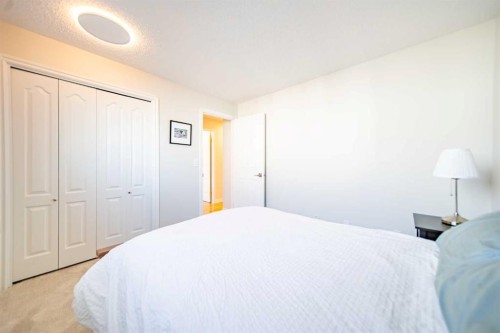 4 Cedargrove Road Sw, Calgary, AB - Indoor Photo Showing Bedroom