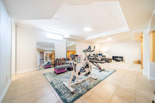4 Cedargrove Road Sw, Calgary, AB - Indoor Photo Showing Gym Room