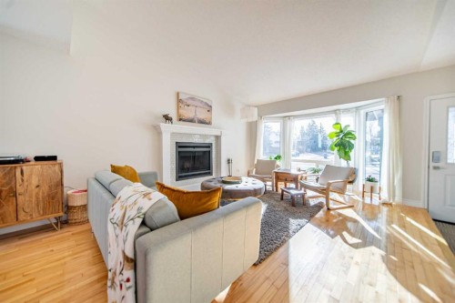 4 Cedargrove Road Sw, Calgary, AB - Indoor Photo Showing Living Room With Fireplace