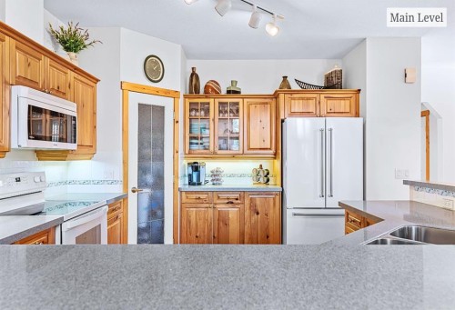 18 Juniper Ridge, Canmore, AB - Indoor Photo Showing Kitchen With Double Sink
