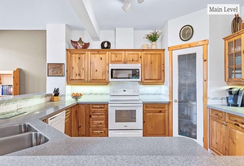 18 Juniper Ridge, Canmore, AB - Indoor Photo Showing Kitchen With Double Sink