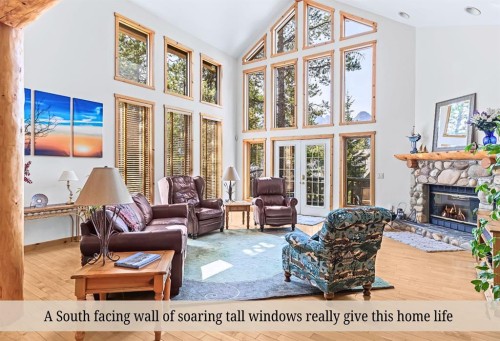 18 Juniper Ridge, Canmore, AB - Indoor Photo Showing Living Room With Fireplace