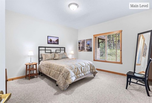 18 Juniper Ridge, Canmore, AB - Indoor Photo Showing Bedroom