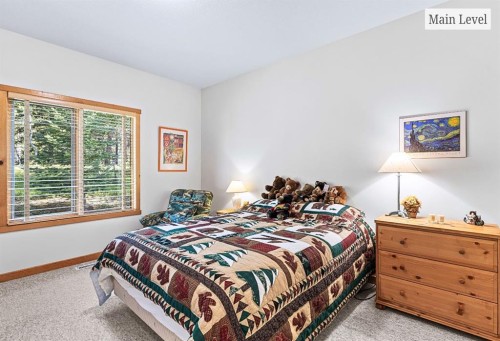 18 Juniper Ridge, Canmore, AB - Indoor Photo Showing Bedroom